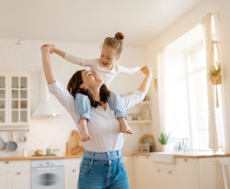 Mother And Child Happily Playing