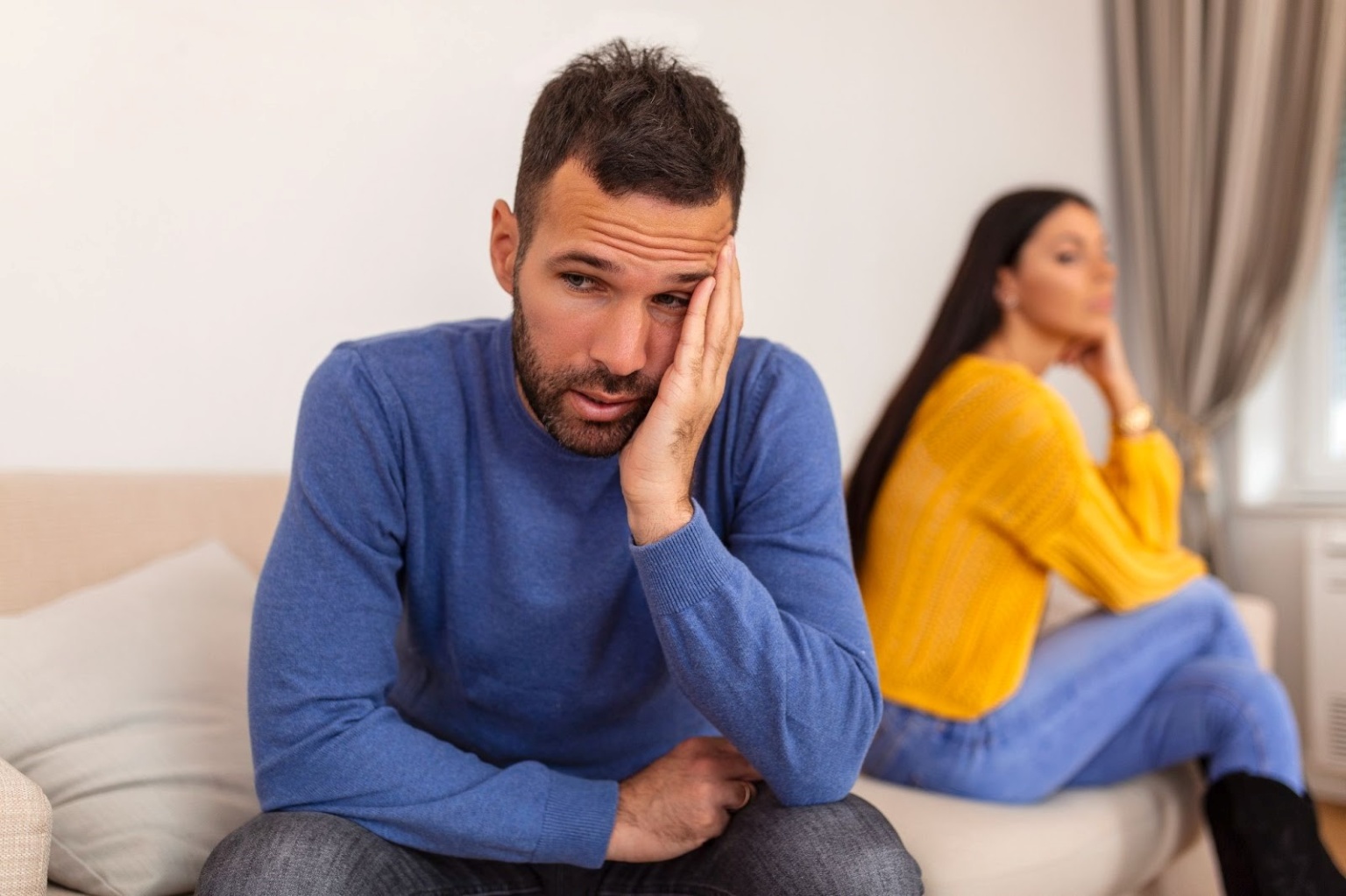 Couple Arguing On The Couch